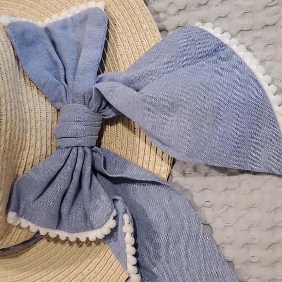 White dressy hat. New, pretty soft bow on the back. Soft blue denim in color. - Picture 3 of 4